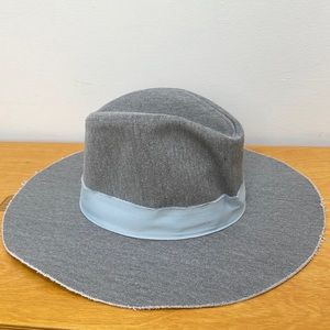 Zara Gray with light blue ribbon hat